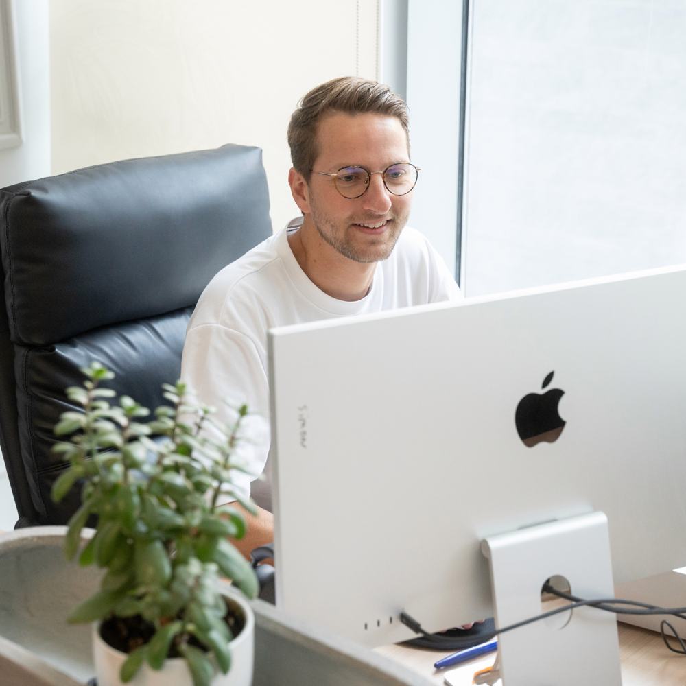Founder working at a desk in an Oh My Desk space in Dubai